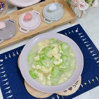 可能是火鍋、豆腐、粥和文字的圖像