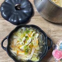 可能是火鍋、粥、豆腐和文字的圖像