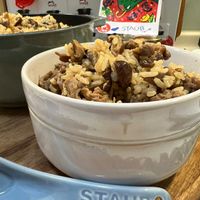 可能是炒飯、北非小米飯和文字的圖像