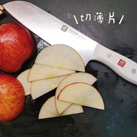 可能是蘋果、刀和文字的圖像