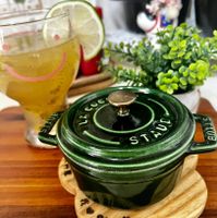 可能是木湯匙、泡茶器和文字的圖像
