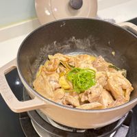 可能是燉小牛膝和文字的圖像