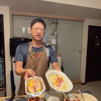 可能是 1 人、歐姆蛋和蛋黃的圖像
