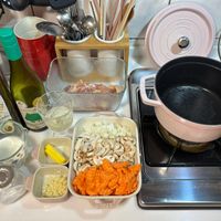 可能是起司火鍋、豆腐和文字的圖像