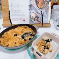 可能是炒飯、豆腐、北非小米飯和文字的圖像