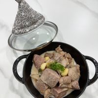 可能是豆腐和燉小牛膝的圖像