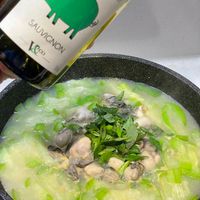 可能是顯示的文字是「 COCHONNET O SUNICNON Veoo SAUVIGNON 」的圖像
