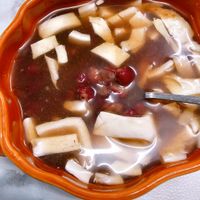 可能是粥、豆腐、甜點和龍眼的圖像