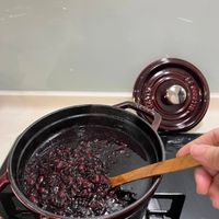 可能是焗豆和木湯匙的圖像