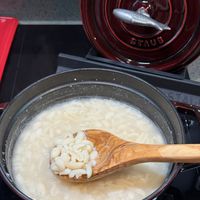 可能是粥和木湯匙的圖像