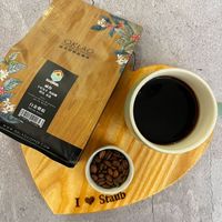 可能是咖啡機、咖啡杯和文字的圖像