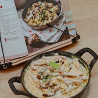 可能是火鍋、豆腐、西班牙大鍋飯和文字的圖像