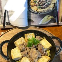 可能是火鍋、豆腐和文字的圖像