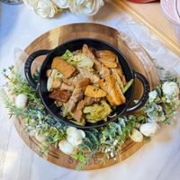 可能是火鍋、豆腐和文字的圖像
