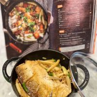 可能是豆腐、香菇、火鍋和文字的圖像