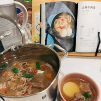 可能是火鍋、粥和文字的圖像