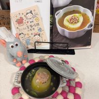 可能是火鍋、豆腐、粥和文字的圖像