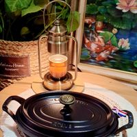 可能是泡茶器和顯示的文字是「 ၁၀၀၀၀၀ an Home LOWERPOT 」的圖像
