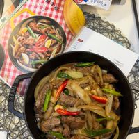 可能是肉排、快炒和文字的圖像