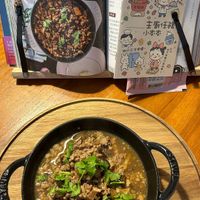 可能是香菇、西班牙大鍋飯和文字的圖像