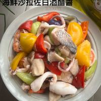 可能是顯示的文字是「鮮沙拉佐白酒醋者 SIPALIB KA 」的圖像