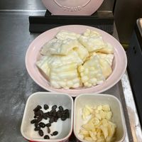 可能是豆腐、甜點、粥和龍眼的圖像