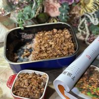 可能是鯷魚、炒飯和文字的圖像