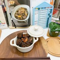 可能是火鍋、豆腐、香菇和文字的圖像