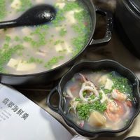 可能是火鍋、豆腐、粥、拉麵和文字的圖像