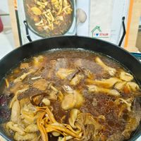 可能是火鍋、香菇、豆腐和文字的圖像