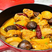 可能是火鍋、豆腐、香菇和文字的圖像
