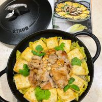 可能是豆腐、西班牙大鍋飯和文字的圖像