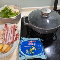 可能是火鍋、豆腐和文字的圖像