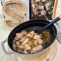 可能是拉麵、豆腐、香菇、火鍋和文字的圖像