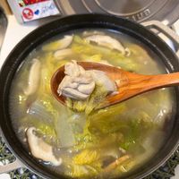 可能是香菇、豆腐、火鍋和顯示的文字是「 0 STAO TUE U3 」的圖像