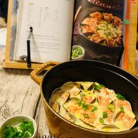 可能是火鍋、豆腐和文字的圖像