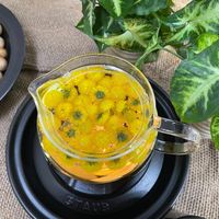 可能是泡茶器、龍眼和小木犀樹的圖像