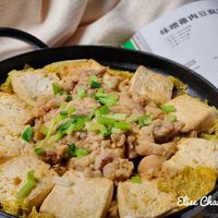 可能是火鍋、豆腐和文字的圖像