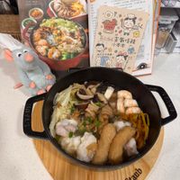 可能是火鍋、豆腐和文字的圖像