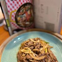 可能是肉排、快炒和文字的圖像