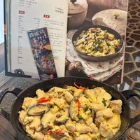 可能是豆腐、西班牙大鍋飯和文字的圖像