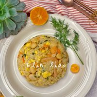 可能是粥、豆腐、西班牙大鍋飯、炒飯和顯示的文字是「 Elinliao Elin liao 」的圖像