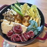 可能是火鍋、豆腐和文字的圖像