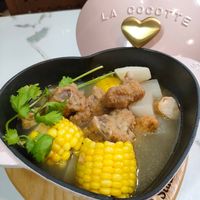 可能是粥、火鍋和顯示的文字是「 UA OCOTTE 」的圖像