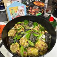 可能是拉麵、豆腐、火鍋和文字的圖像