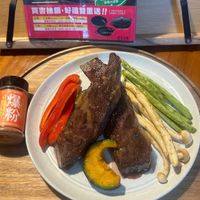 可能是肉排和文字的圖像