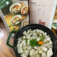 可能是粥、火鍋、豆腐和文字的圖像