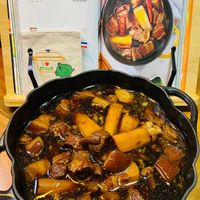 可能是火鍋、豆腐、香菇和文字的圖像