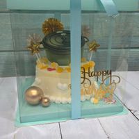 可能是植物保護罩、婚禮蛋糕和顯示的文字是「 Happ wnc Hapy සංරි vuhday Galaxy GalaxyS25Ultra S25 Ultra 」的圖像
