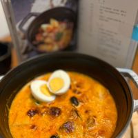 可能是拉麵、水波蛋、粥、豆腐和文字的圖像